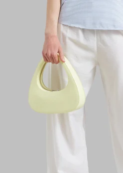 The Frankie Shop Coperni Patent Baguette Swipe Bag Light Yellow Online