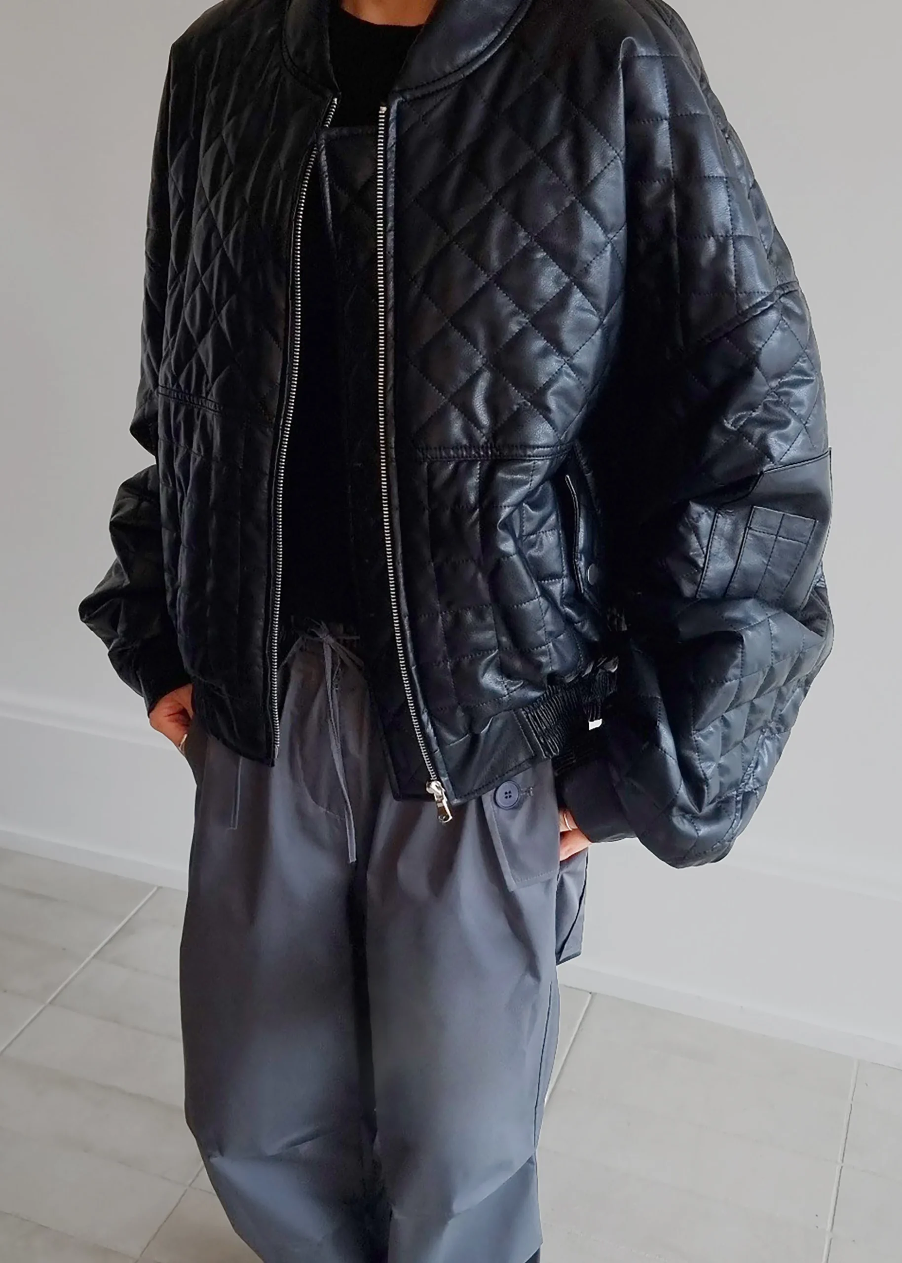 The Frankie Shop Alma Quilted Faux-Leather Bomber Black